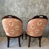 Pair of carved solid mahogany gondolas from the 19th century