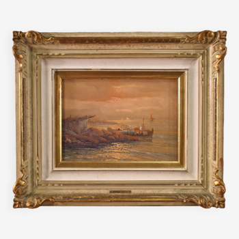 Seascape signed by Remo Testa, fishermen at sunset