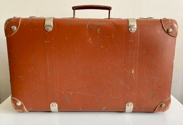 Small old brown suitcase