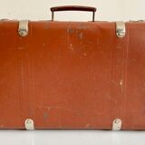 Small old brown suitcase