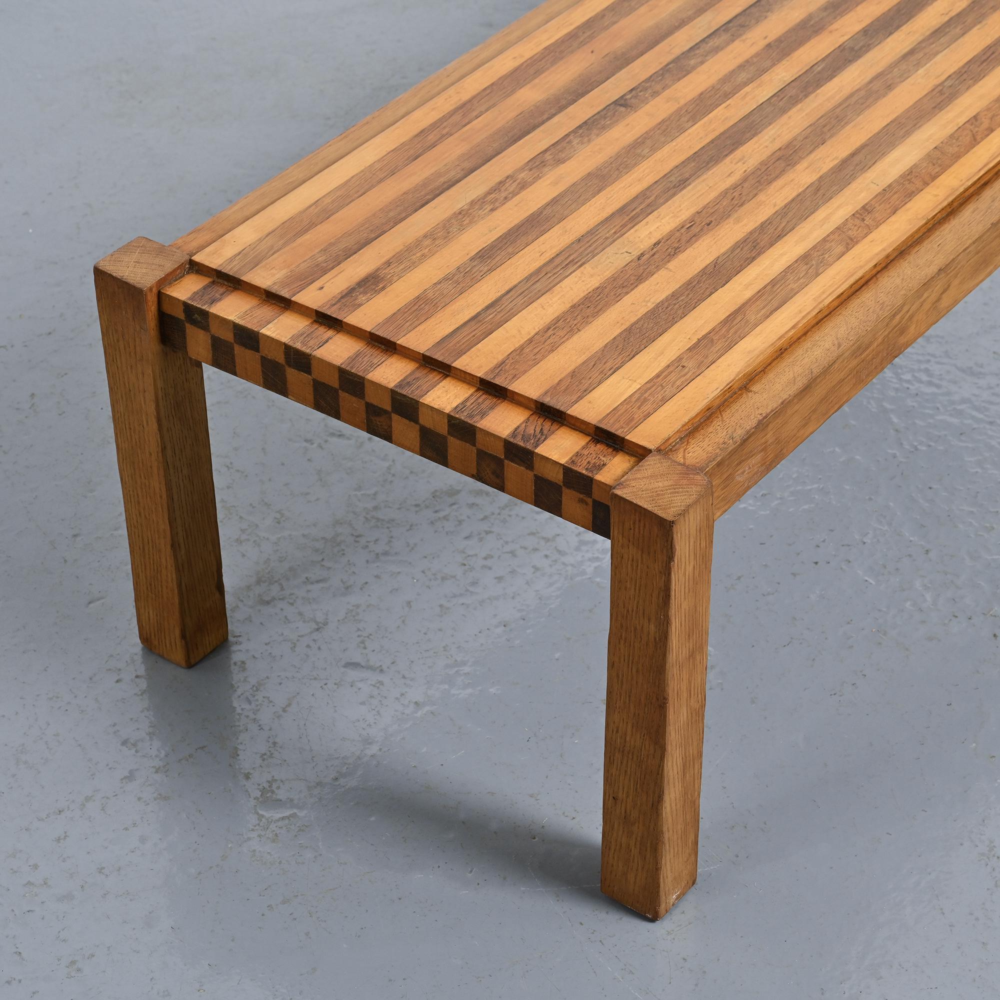 Two-tone wooden graphic coffee table, circa 1960.