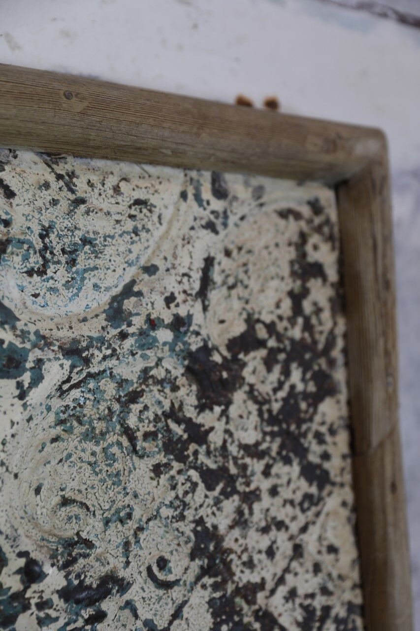 Decorative panel with patinated metal and wood