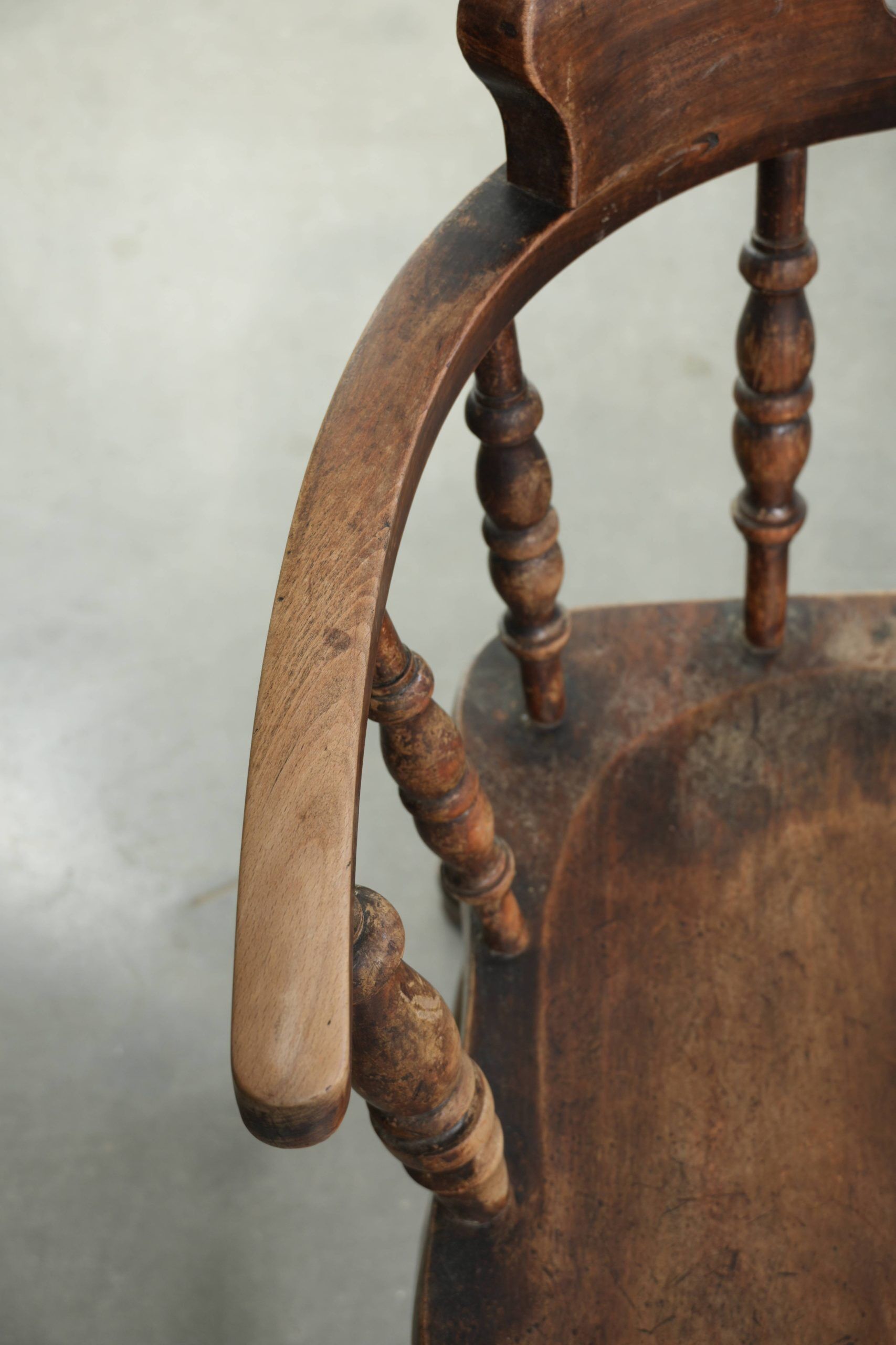 Set of four wooden English antique pub/captain chairs from the 19th century