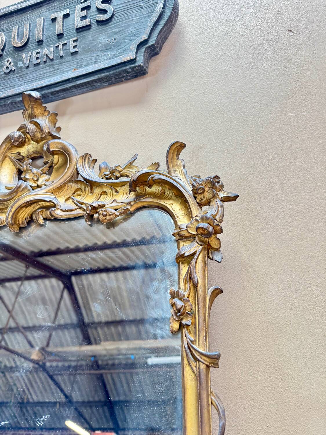 Louis XV period wooden and gilded stucco mirror, 18th century