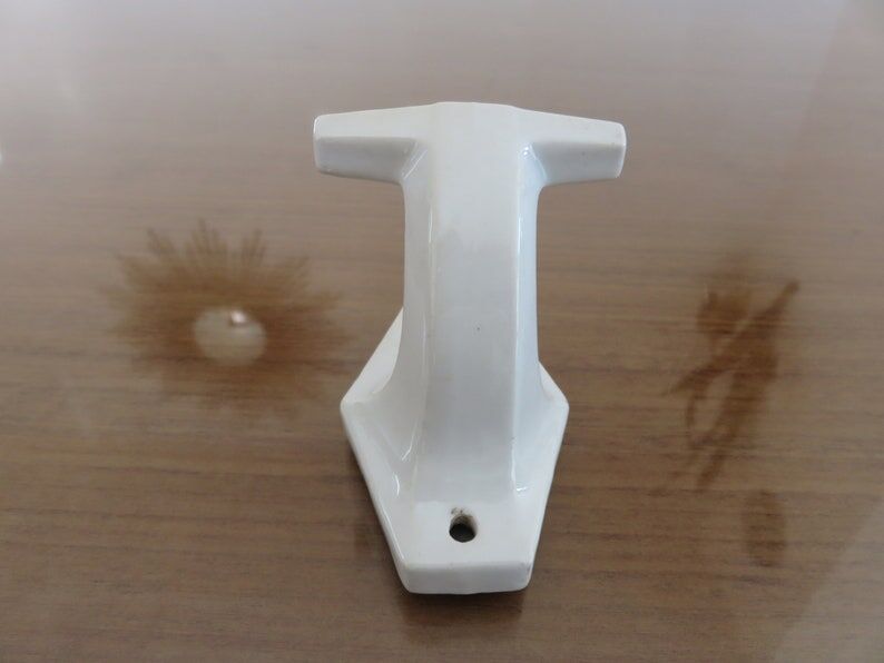 Old coat hook in white porcelain art deco years 30 40