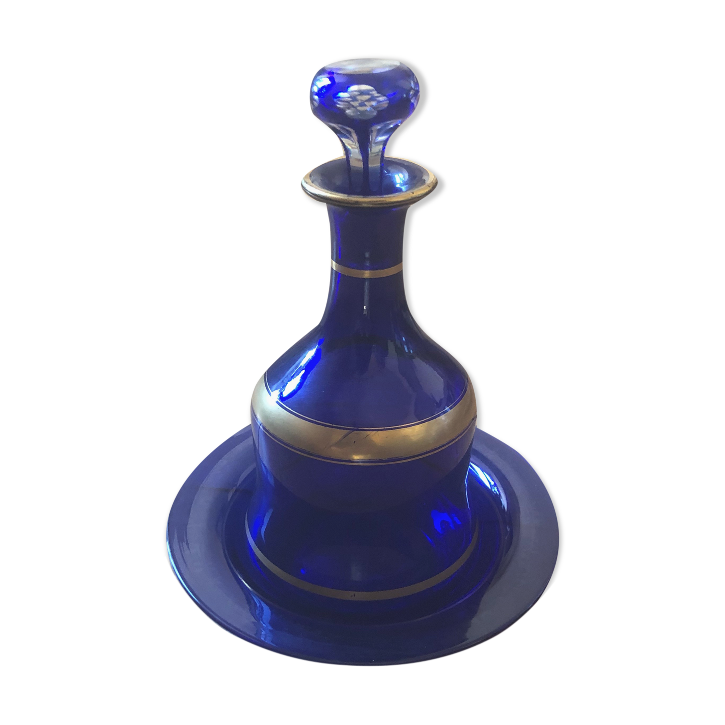 Night carafe and its blue glass saucer