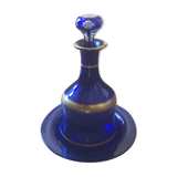 Night carafe and its blue glass saucer