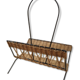 Wearing vintage rattan and black iron design magazines of the 1960s.