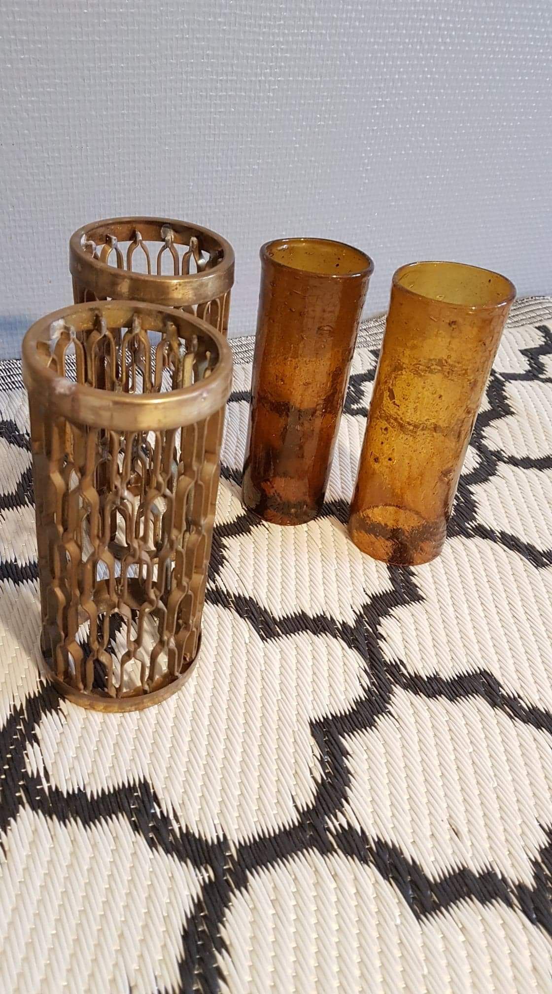Photophores moucharabieh style candlesticks in brass and orange bubbled glass