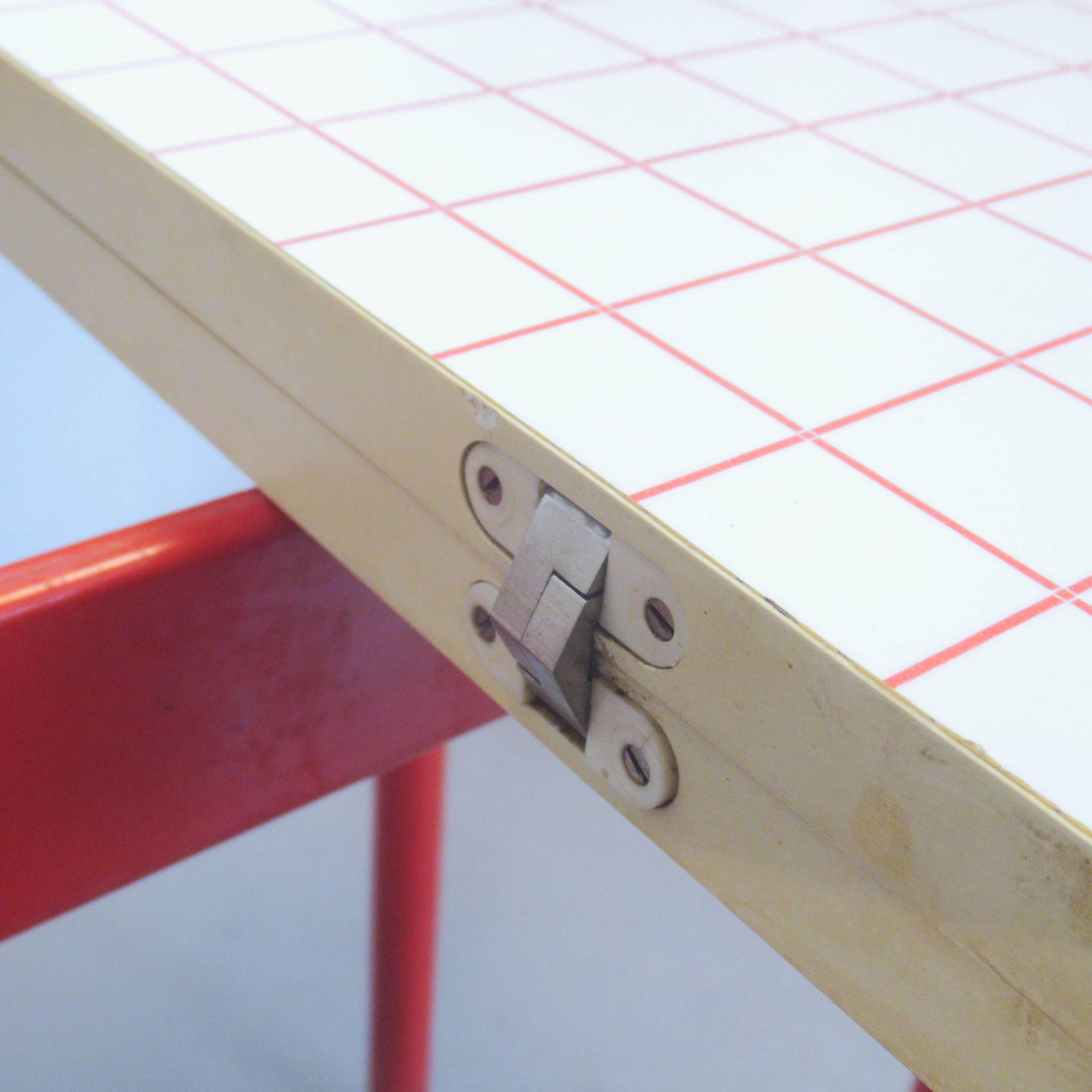 Foldable table with red checkered pattern from the 80s.