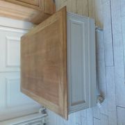 Coffee table on casters, made from an old desk, pearl gray base and belt.