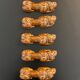 10 ceramic knife holders in the shape of a recumbent poodle