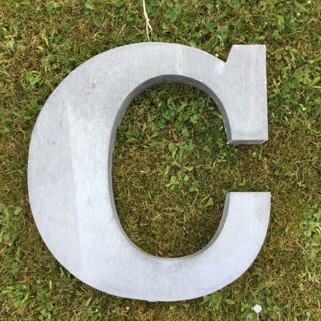 Ten letters sign in zinc material