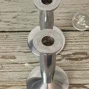 Pair of minimalist polished aluminium candle holders