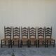 Set of 6 high-backed straw-seated chairs in solid oak from the early 1900s.