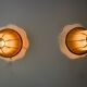Pair of pear-shaped "cocoon" wall lights, resin and pine, Italy, 1970