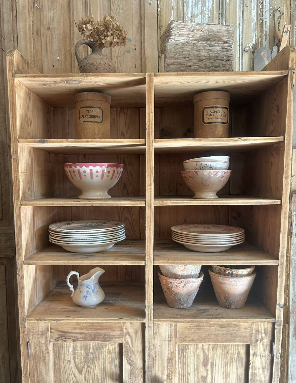 Antique workshop cabinet with compartments and doors