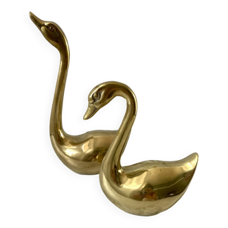 pair of slender brass swans 1950s