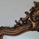 Antique Louis Philippe mirror with a pediment.