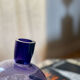 Purple vase inclined