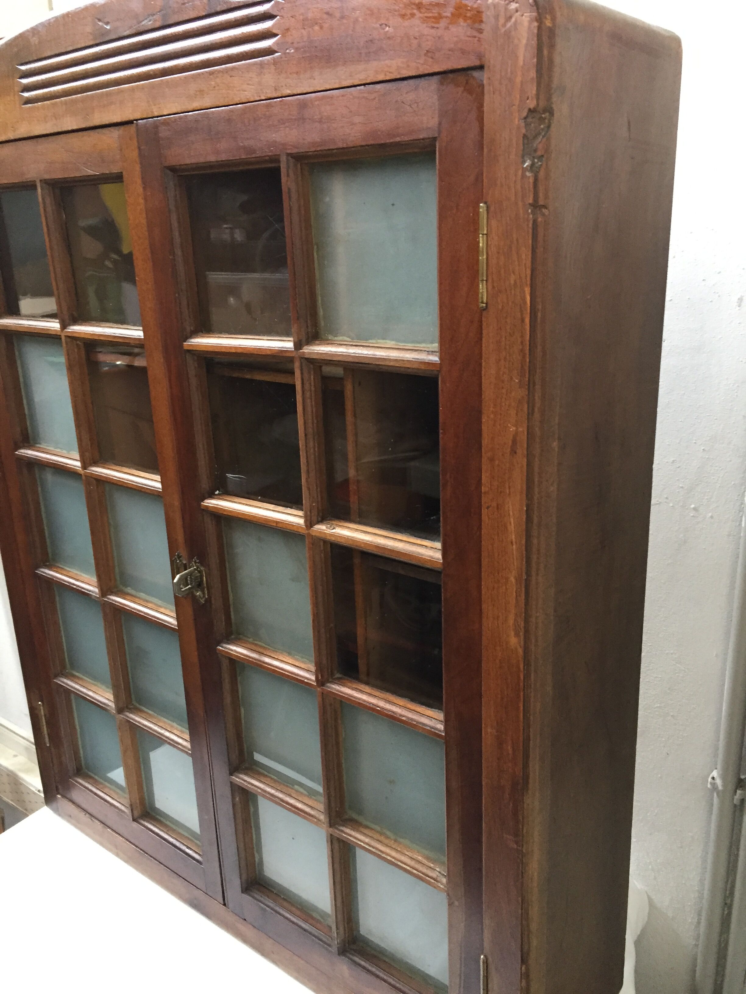 Old wall case has pharmacy