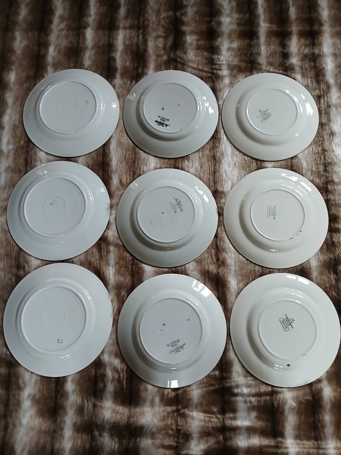 9 mismatched antique dinner plates