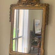 Mirror with a golden frame