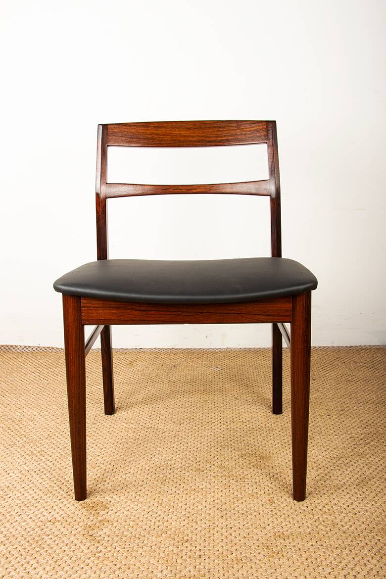 4 Danish chairs in rosewood and new leatherette by Henning Kjaernulf 1960.