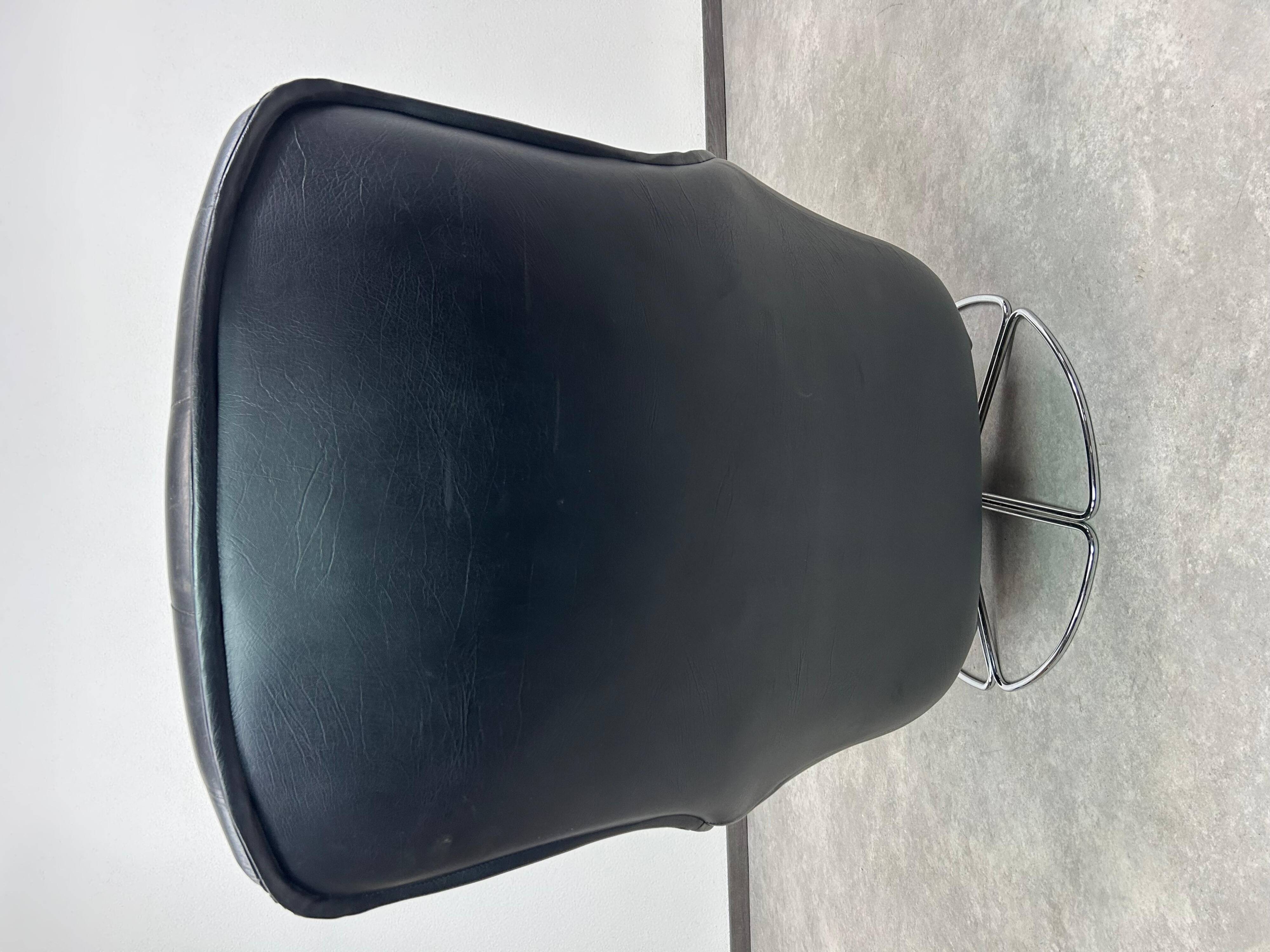 Black leather wingback swivel chair by PeeM