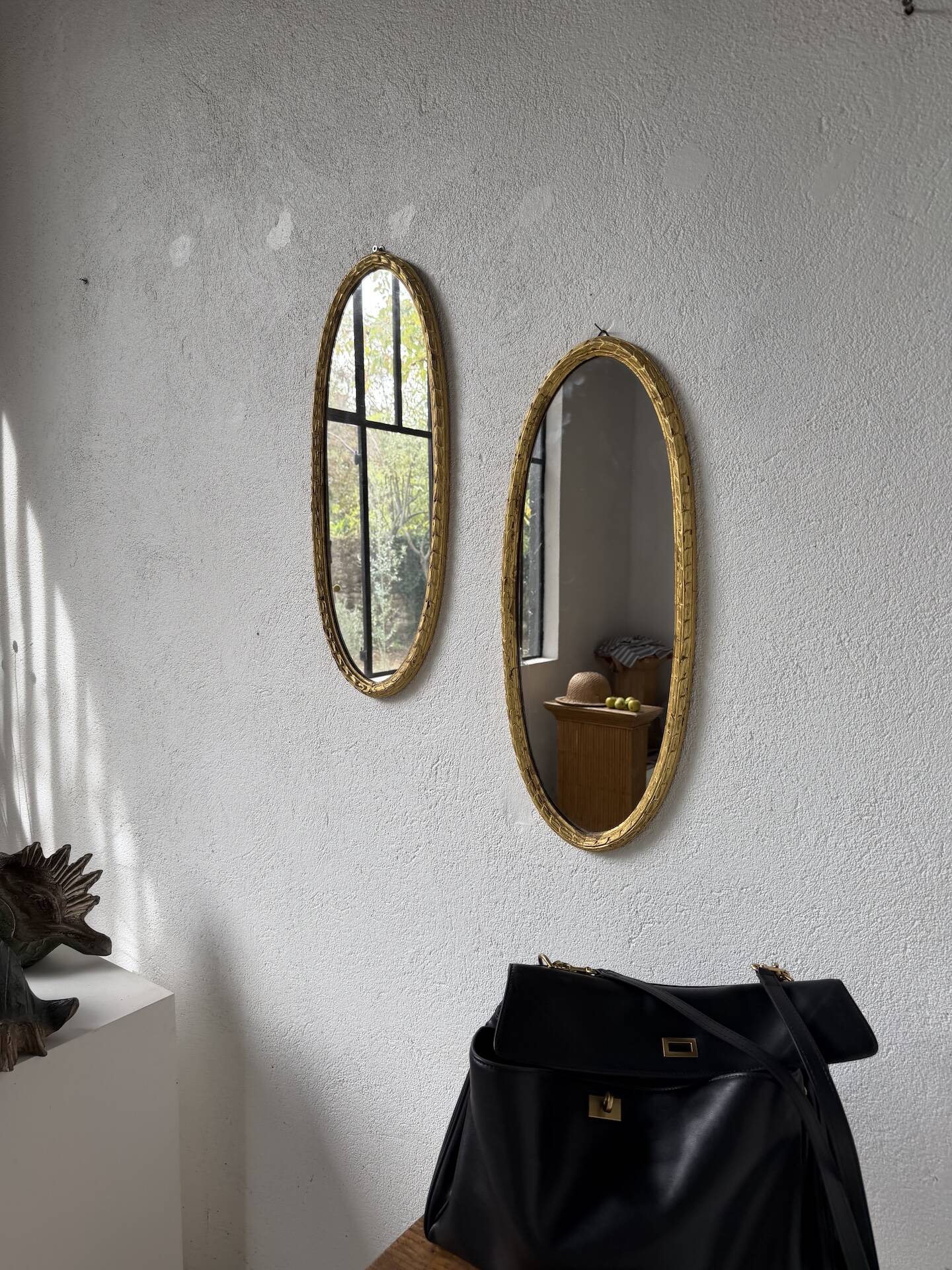 Pair of oval mirrors 1900 gilded stucco