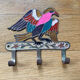 Hanging cloth bird brass
