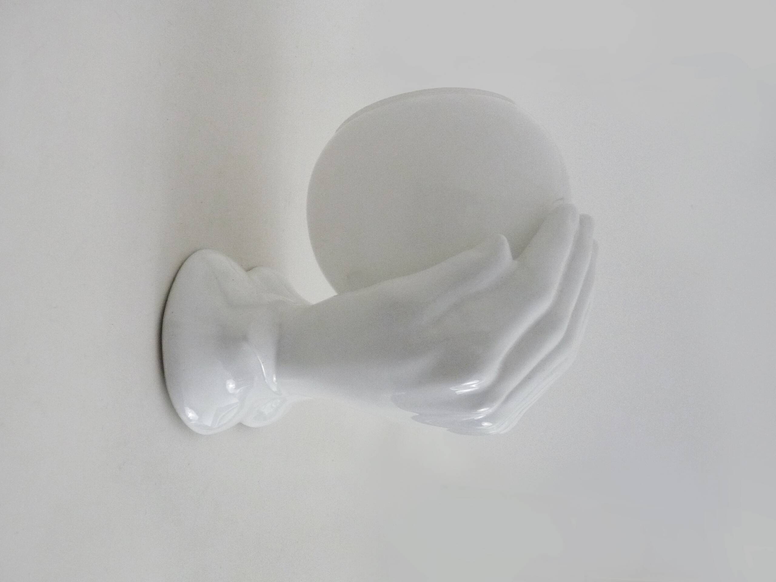 Ceramic pair of hands wall light from the 1970s.