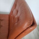 Vintage armchair in brown leather