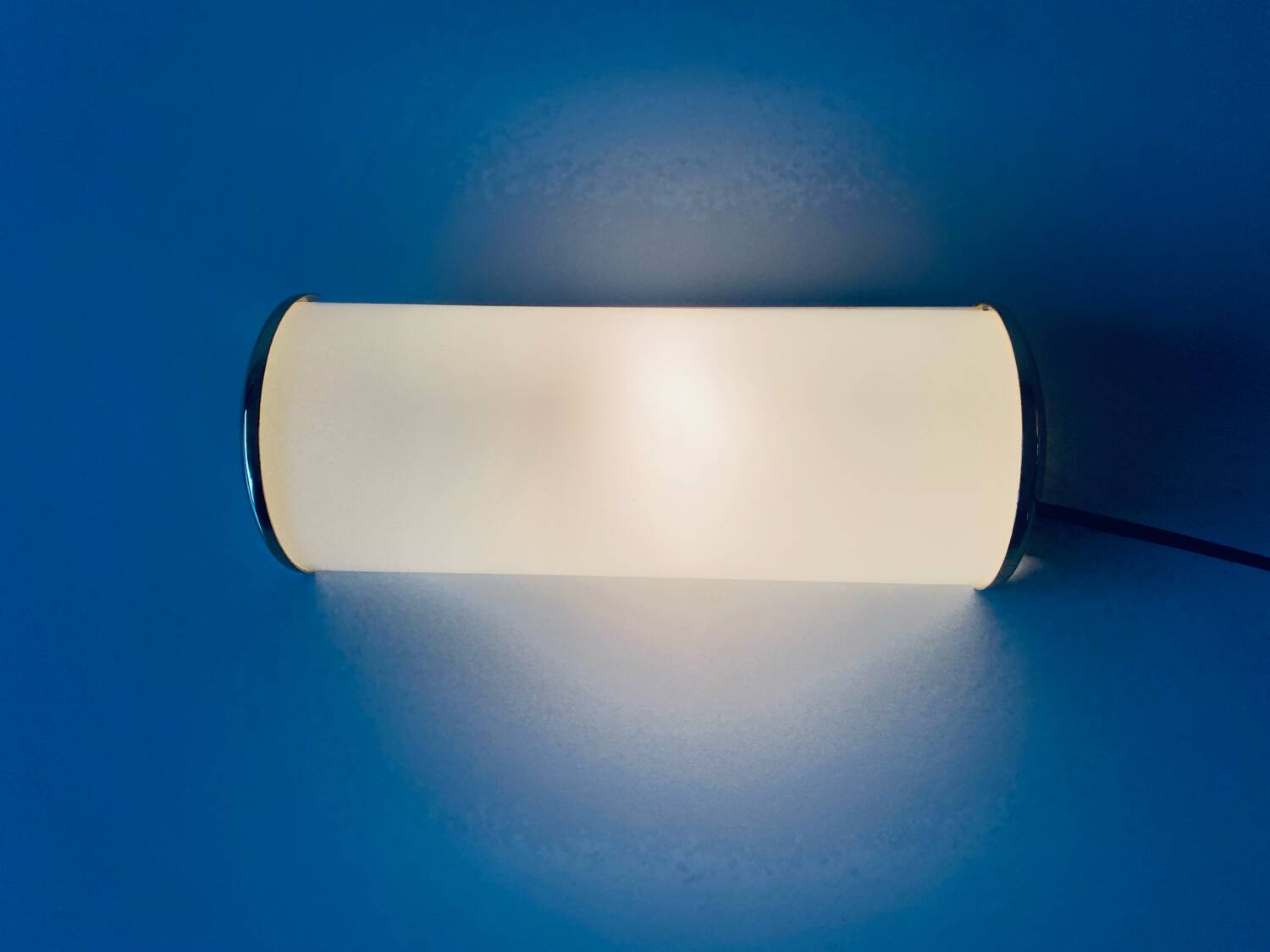 Brass and glass wall light