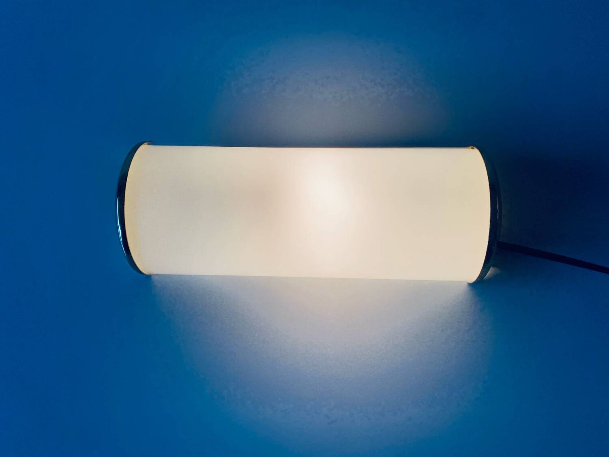 Brass and glass wall light
