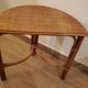 Rattan half-moon console