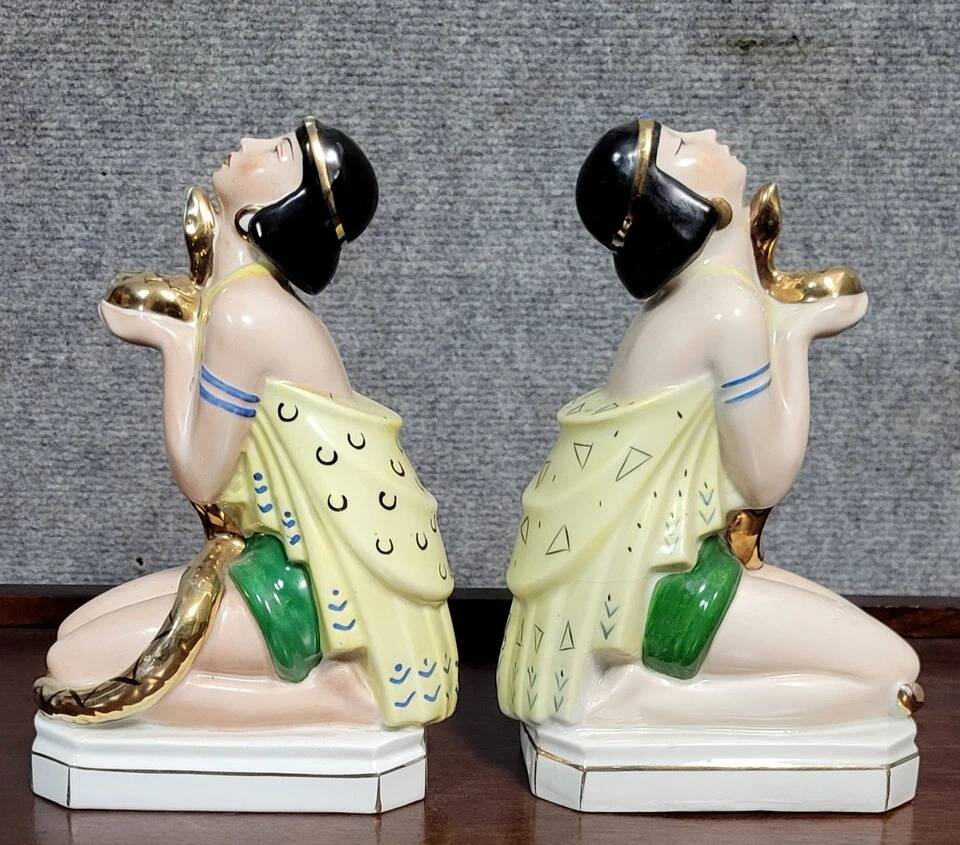 Pair of polychrome porcelain night light statues in Art Nouveau style