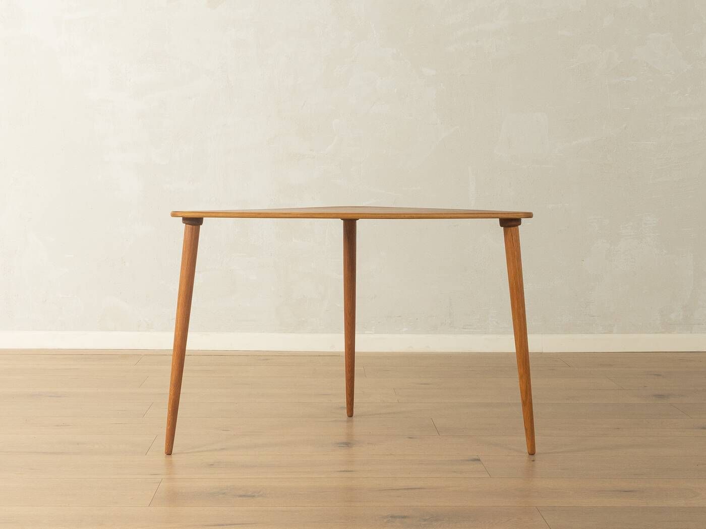 Elegant side table from the 1960s with triangular silhouette, teak wood