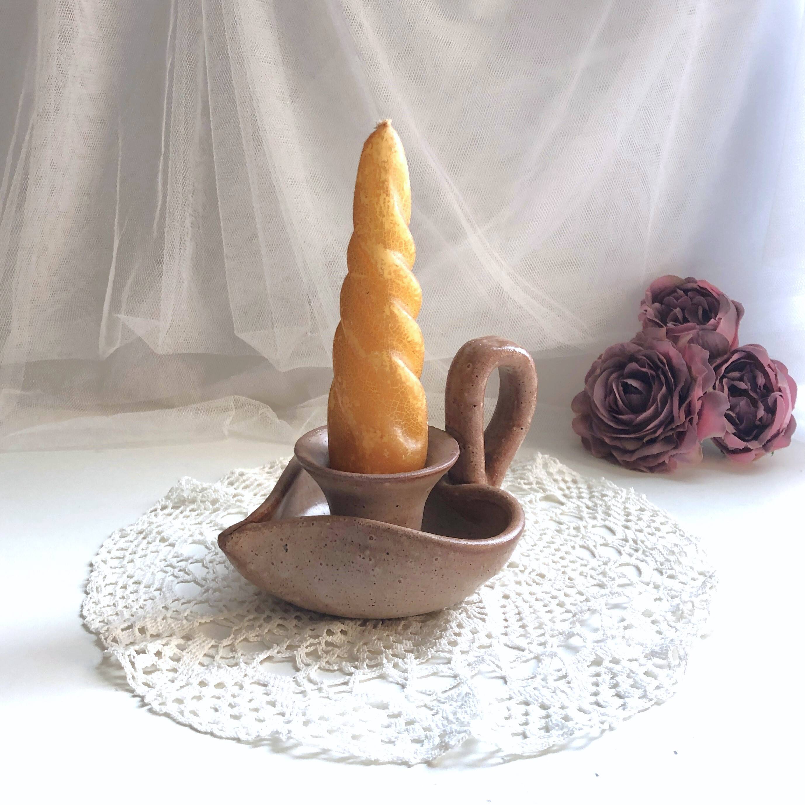 Glazed stoneware heart-shaped hand candle holder