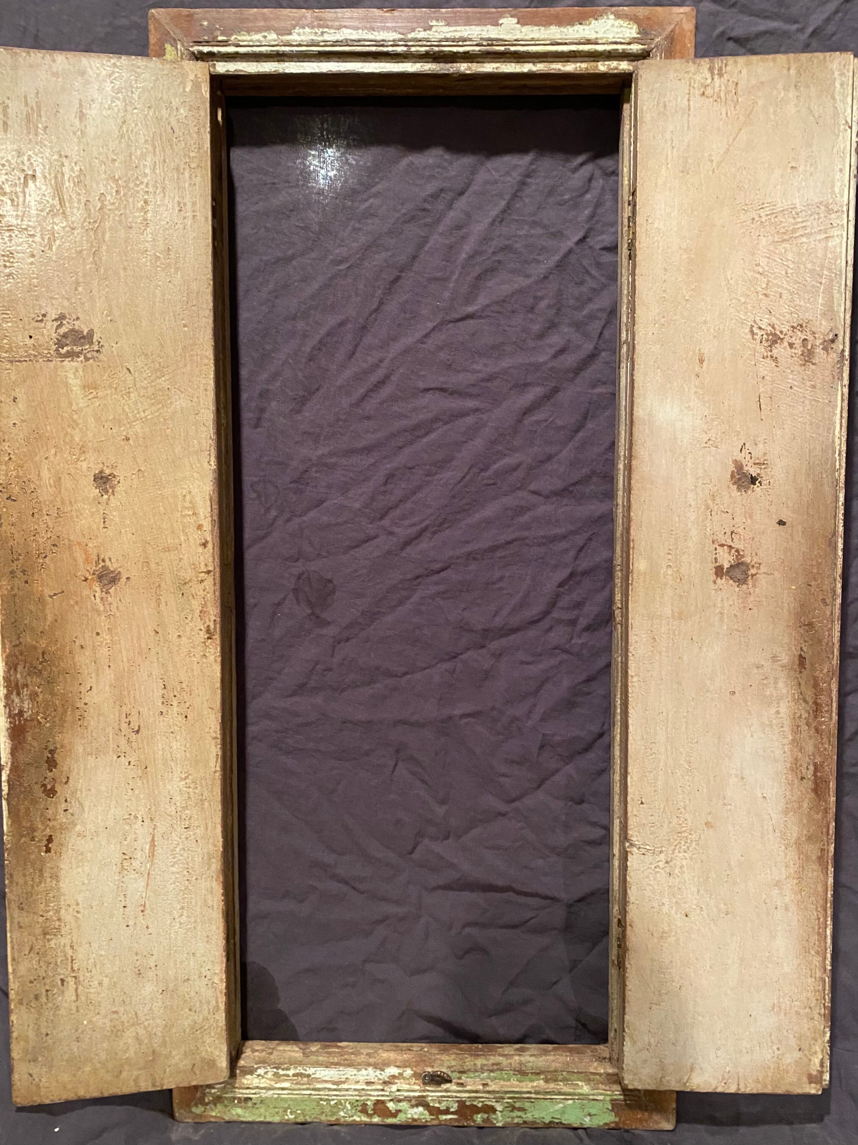 Indian window in green patinated wood