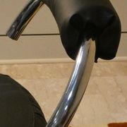 Cobra chairs in steel and black leather by Giotto Stoppino, 1970s, set of 5.