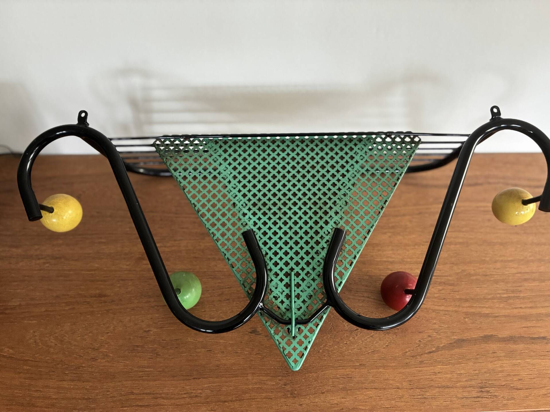 Vintage wall coat rack from the 1950s.