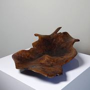 Large monoxyle bowl made of dark raw olive wood from the 1950s.