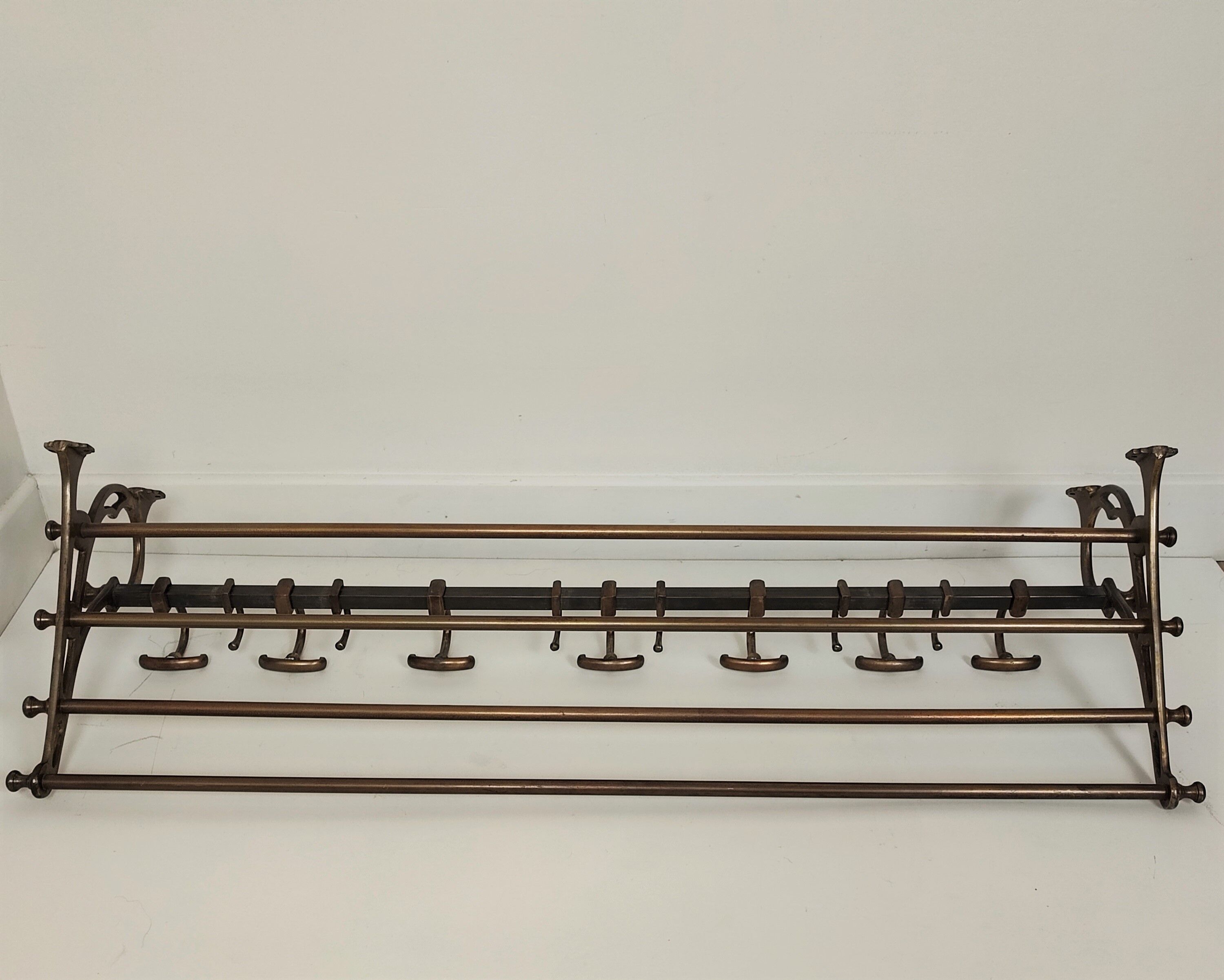 Brass wall coat rack
