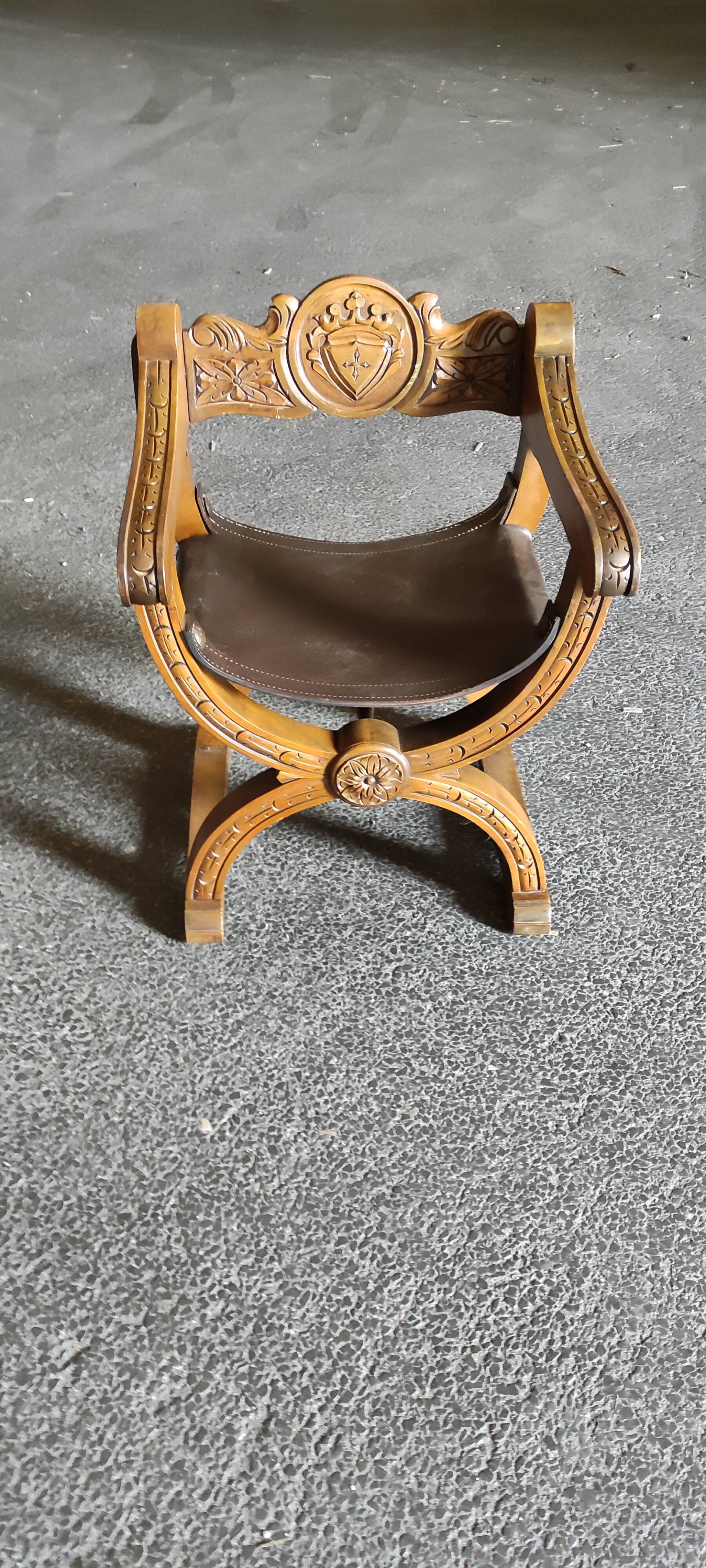 Armchair called Dagobert in wood and leather
