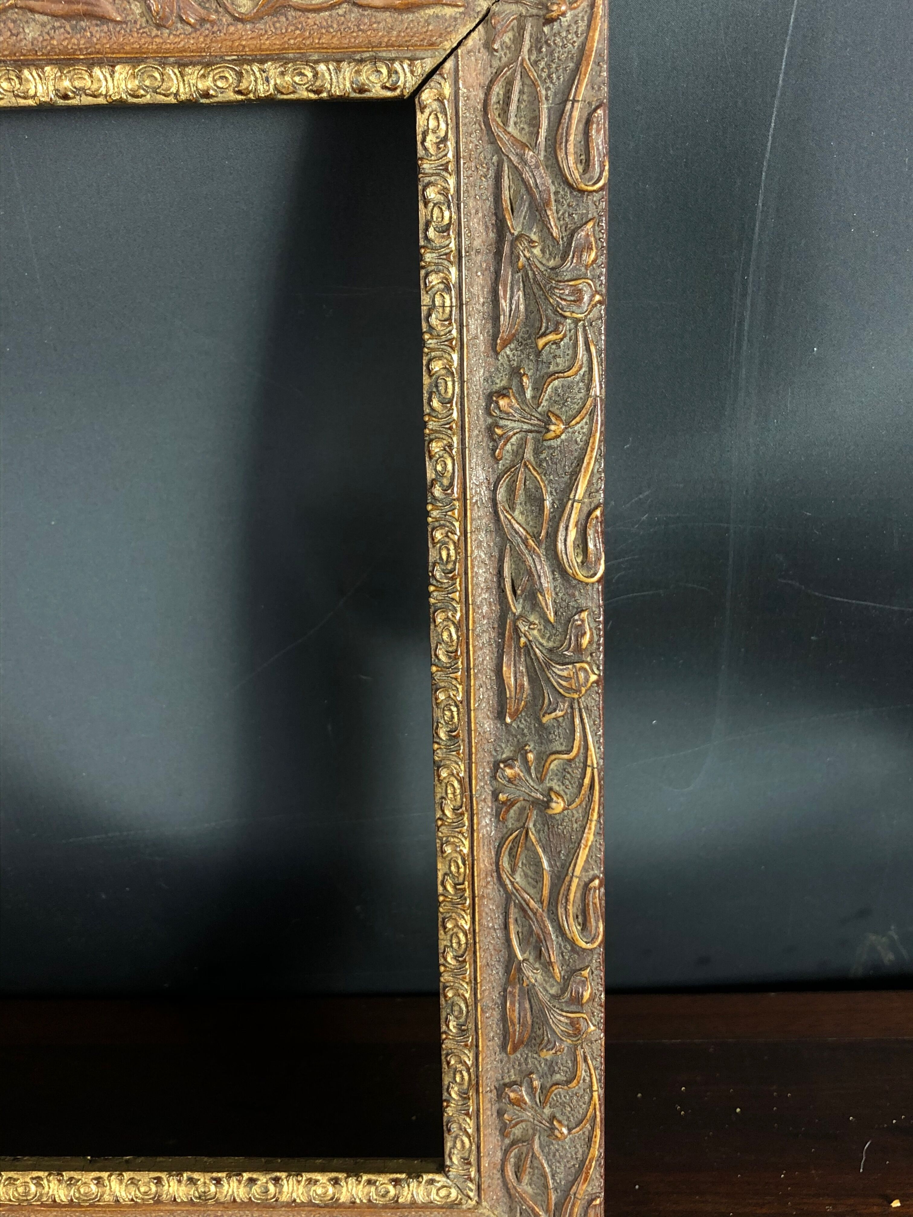 Old frame wood and stucco patinated and gilded