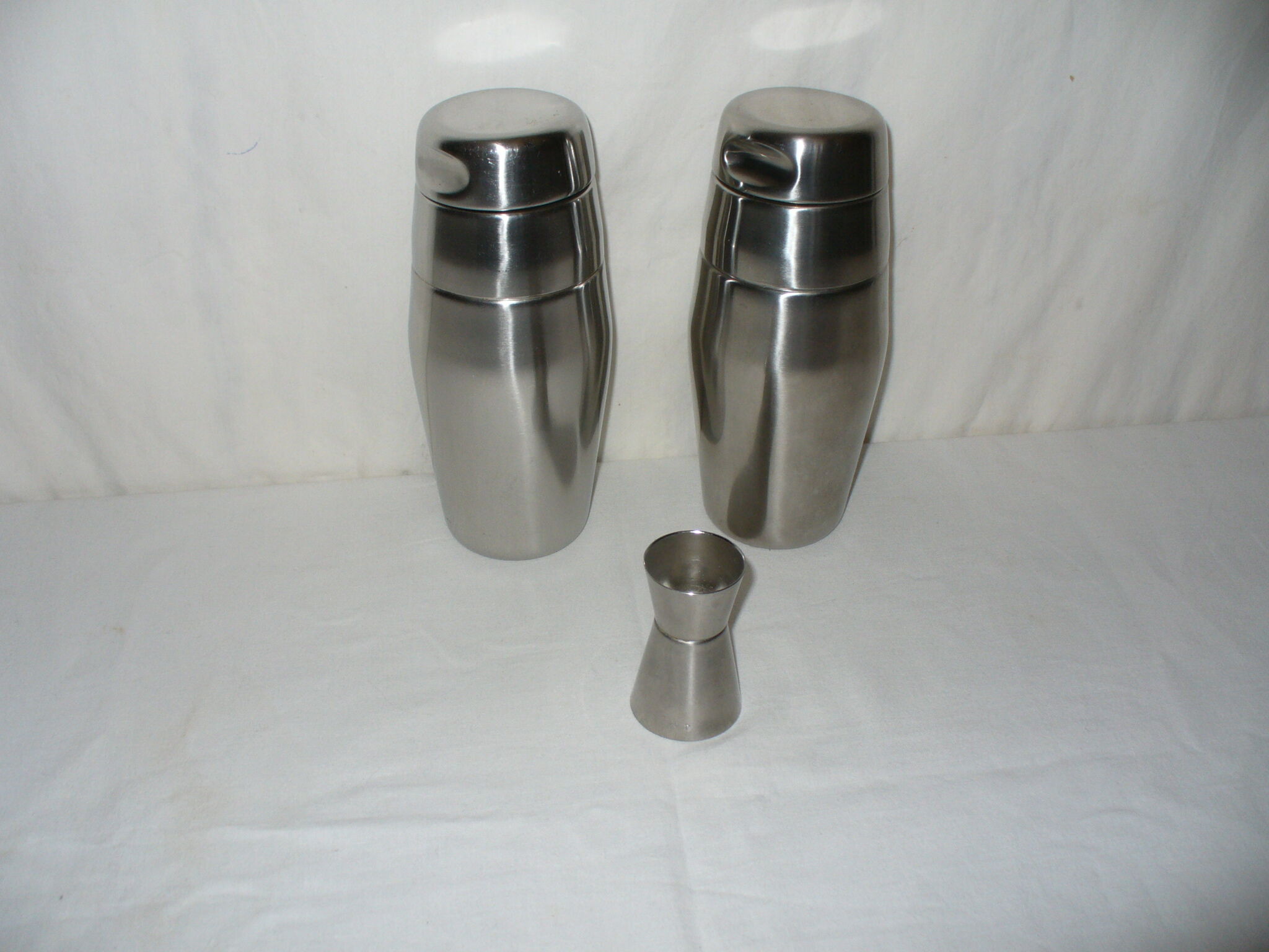 Pair of shakers Alessi - Mazzeri; Massoni of the 50s