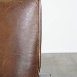 A stately, well-preserved, and comfortable sheepskin armchair