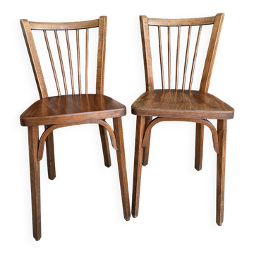 Pair of vintage Baumann bistro chairs in wood.