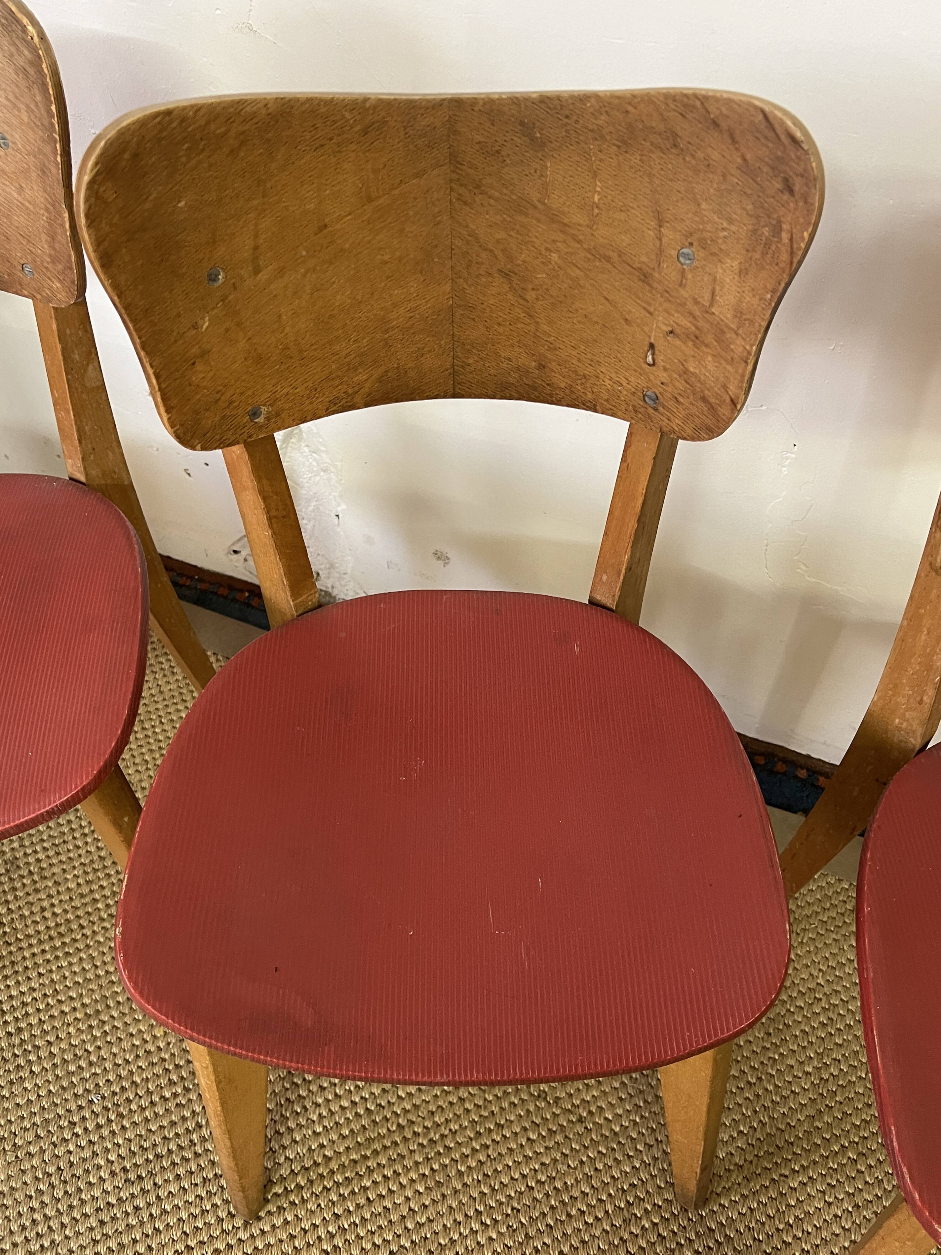Suite de 4 chaises bistrot en bois vintage